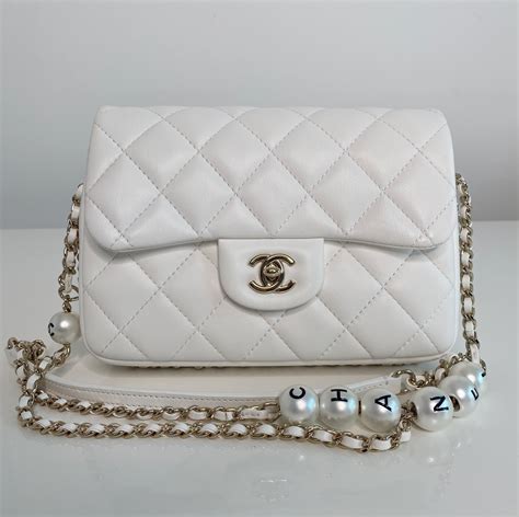 chanel purse with pearl strap|Chanel handbags outlet.